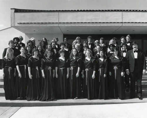 Dr. Paul Piersall with the Seaver College Chorus in front of Smothers Theatre