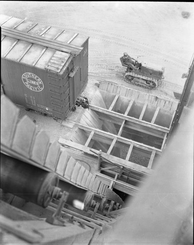 Looking Down on Railroad Car and Caterpiller