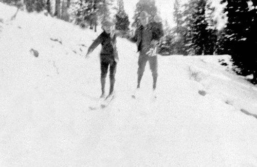 Two men on skis