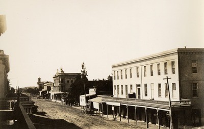 Stockton - Streets - circa 1880s: Main St. and Center St. with original Weber House