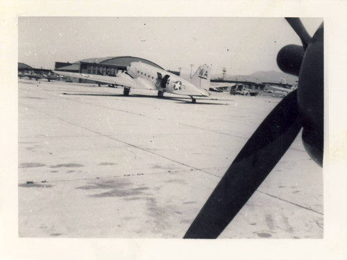 R4-D cargo transport airplane at MCAS El Toro, 1947 in front of hangar