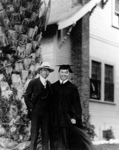 Peter Soo Hoo with a friend on graduation day