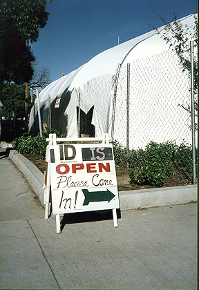 ID store sign outside a temporary pavilion
