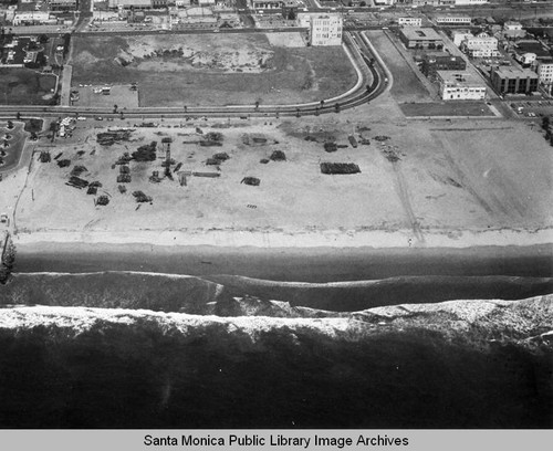 Looking east from the remains of the Pacific Ocean Park Pier to the Santa Monica Shores high-rise, July 30, 1975, 10:30 AM
