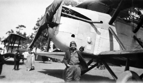 Man in front of airplane at Martin's airfield, Santa Ana, ca. 1930