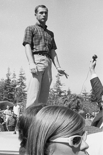 [Charles Powell?] speaking from top of police car