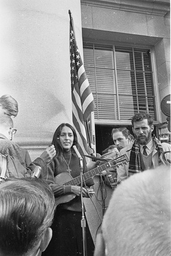 Joan Baez and Steve Weissman in front of Sproul Hall