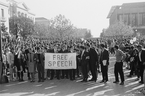 Marchers carrying Free Speech sign to the UC Regent's meeting inUniversity Hall on Oxford St