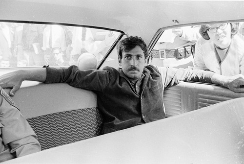 Jack Weinberg in the back seat of the police car