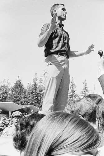 [Charles Powell?] speaking from top of police car