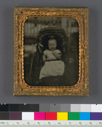 [Baby, presumed to be Frank Mattison, in a stroller.]