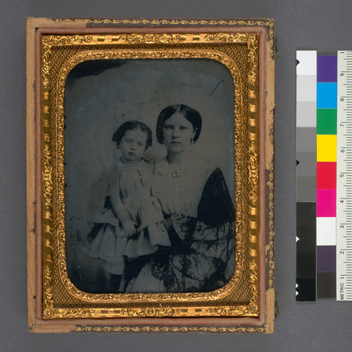 [Unidentified young mother and daughter.]