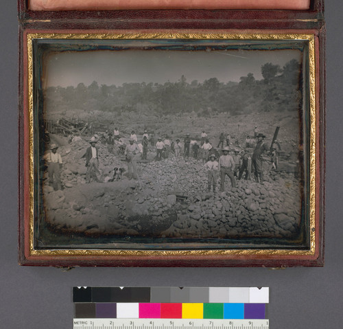 [Mining scene in rocky diggings near Lincoln, California, with 39 miners.]