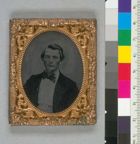 [Unidentified young man wearing a bow tie.]