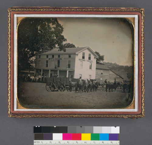 [Smith's Exchange, Natoma Valley, with wagons and teams in front of building.]