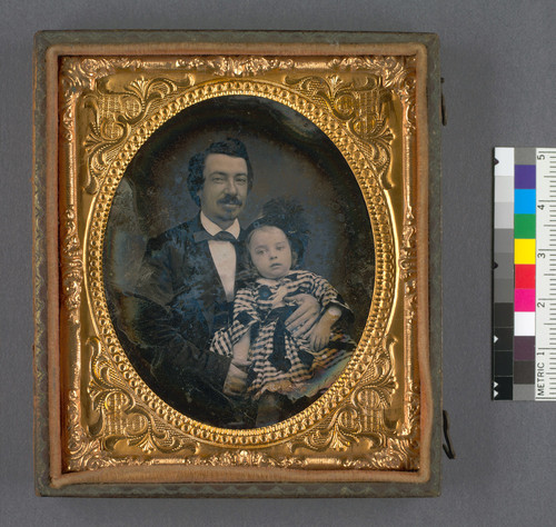 [Unidentified man and baby girl.]