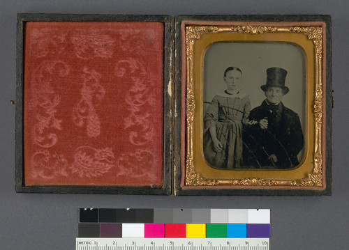 [Catherine Joeckel Schütt and Grandfather Joeckel in a top hat.]