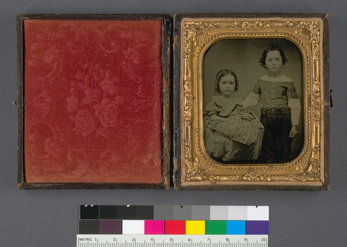 [Two unidentified children: a boy and a girl.]