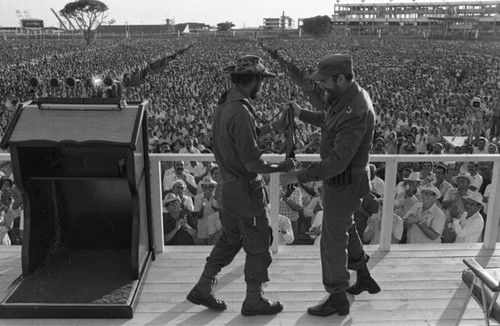 Fidel Castro holds a rifle, Havana, 1980