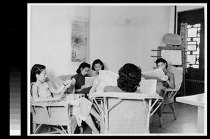 Women students of Yenching University in the dormitory common room, Beijing, China, 1941
