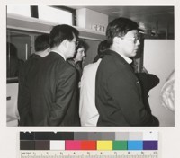 Unidentified people walking somewhere