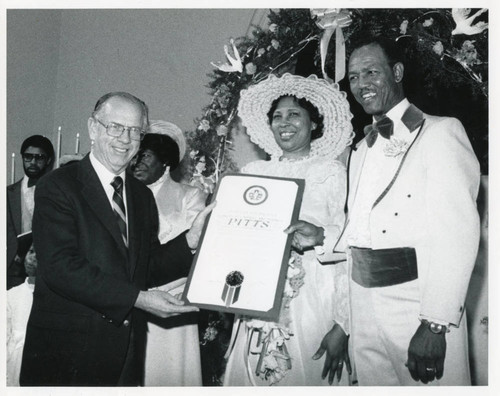 Carroll and Bernice Pitts receiving commendation from Kenneth Hahn