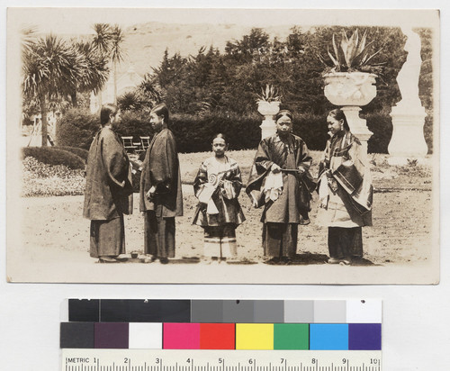 [Four Chinese women and one girl in traditional Dress]