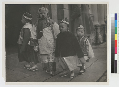 [Children in traditional dress]