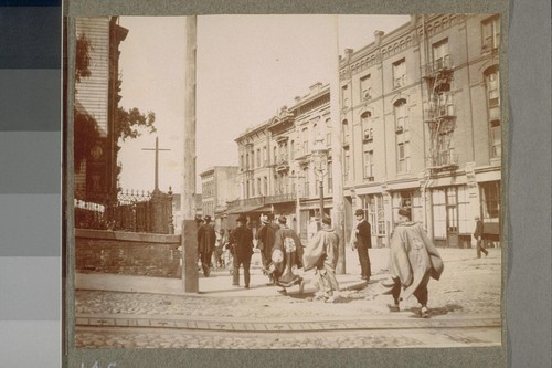 [Street scene with Chinese priests.]