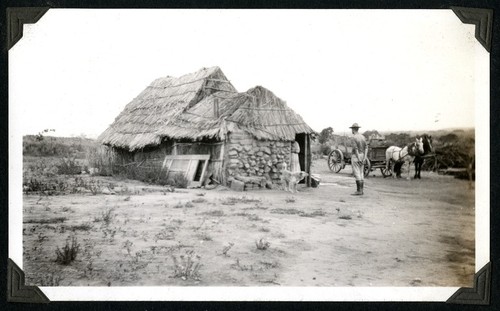 Peveril Meigs asking directions at house on road from Ensenada to Santo Tomás