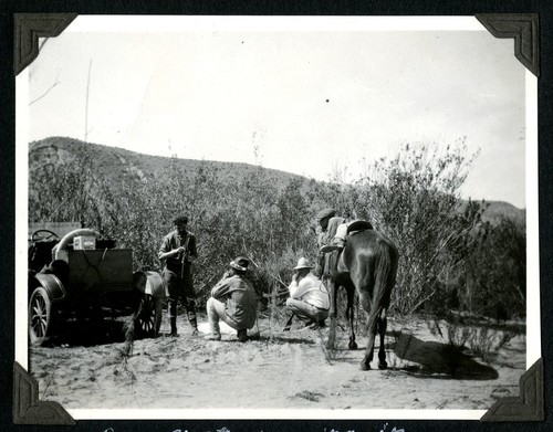 Our first morning in the valley of El Rosario: mending tires with an enthusiastic audience