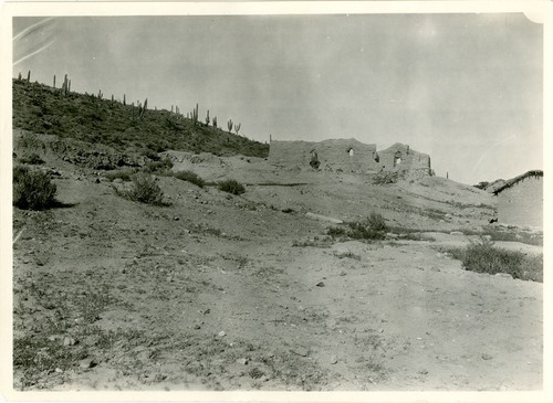 San Fernando Mission with modern house to the right