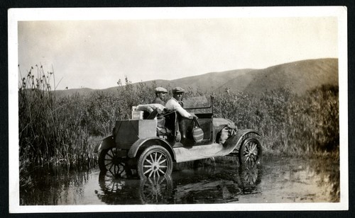 Warren Thornthwaite, left, and Ruperto Espinoza Arce, the mayor of El Rosario, bound for home after their swim in the ocean. "The road," said the mayor, "is fairly good"