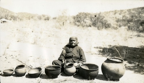 María Jat'ám, India rayada, at Manteca with some of the pots she made