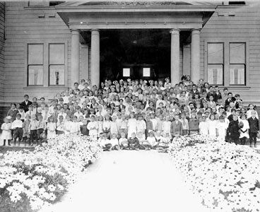 Students on front steps of Cornell School