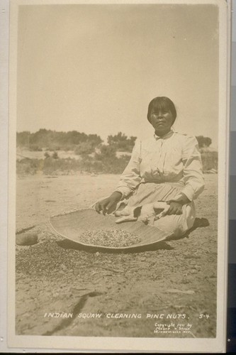 Woman cleaning pine nuts; 1 print, 1 negative