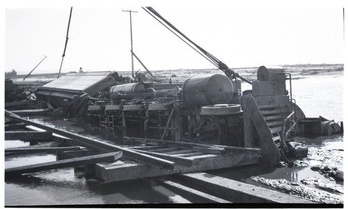 SD&A locomotive 50 in flooded Sweetwater River, San Diego County