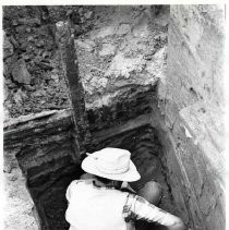 Photographs from Old Sacramento City Hotel Excavations, with unidentified archaeologist, digging