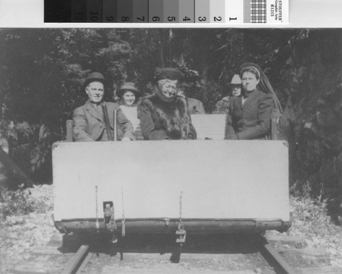 A gravity car on the Mount Tamalpais and Muir Woods Railway with railroad superintendent William Thomas at the controls