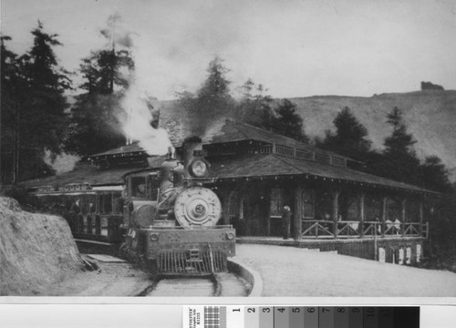 Shay engine No. 3 of the Mount Tamalpais & Muir Woods Railroad in front of the Muir Woods Inn at the edge of the canyon forest