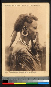 Woman wearing elaborately plaited hair, Kenya, ca.1920-1940
