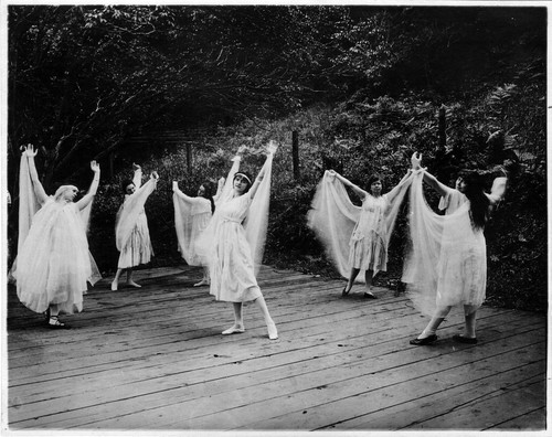 Photograph of dancing women