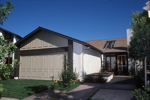 [Montiel Patio Homes, plan C model home exterior slide]