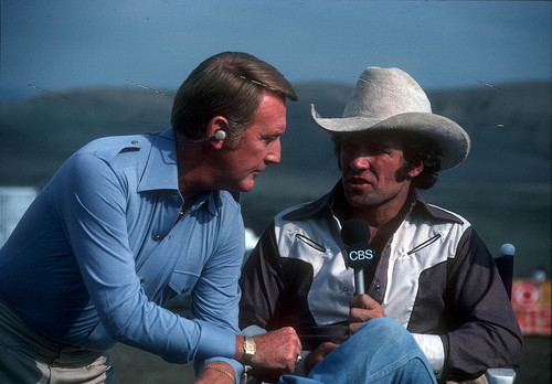 [Vin Scully interviewing rodeo event participant at "Challenge of the Sexes," 1976 slide]