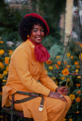 [Wanda McClain on 1977 Rose Parade float slide]