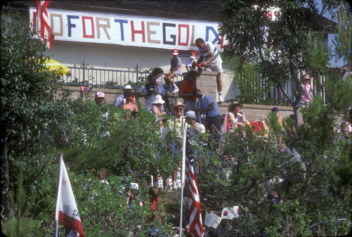 [1984 Olympics Cycling Road Race "Go For the Gold" banner slide]