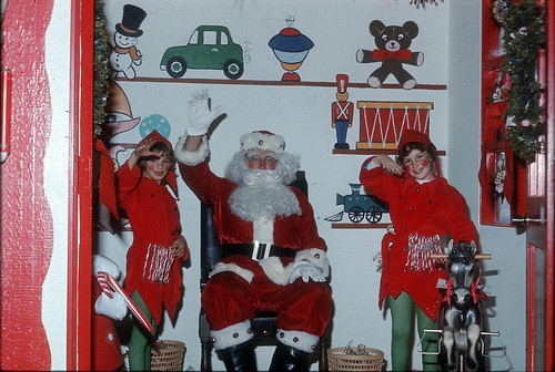 [Santa Claus and elves inside Santa's Work Shop, 1974 slide]