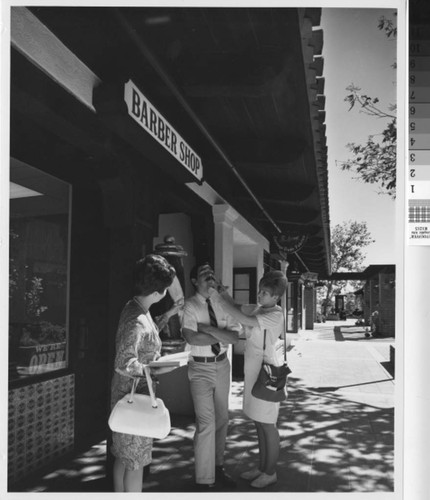 [Barber shop mustache trimming photograph]