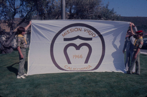 [Boy Scouts with Mission Viejo flag slide]