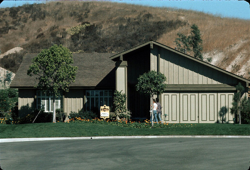 [Castille model home exterior, plan 1, El Greco slide]